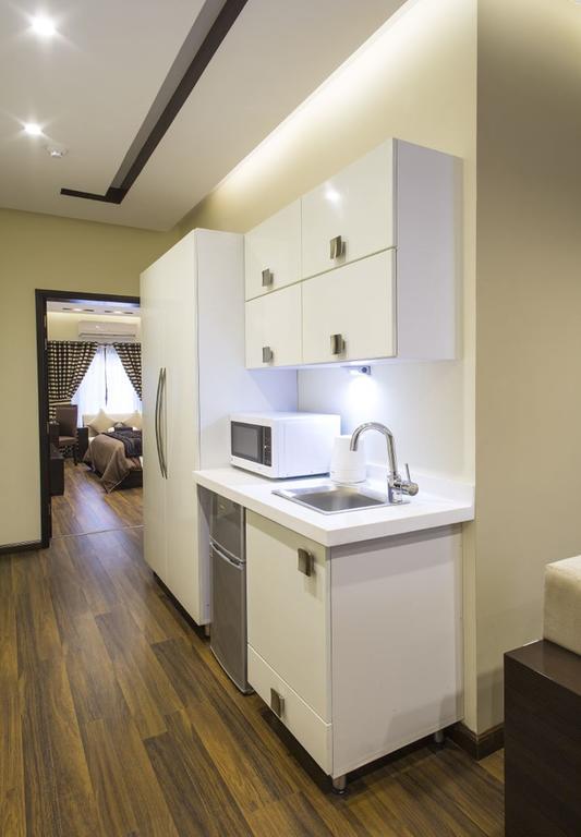 Royaute Luxury Suites And Hotel Gulberg Lahore Room photo